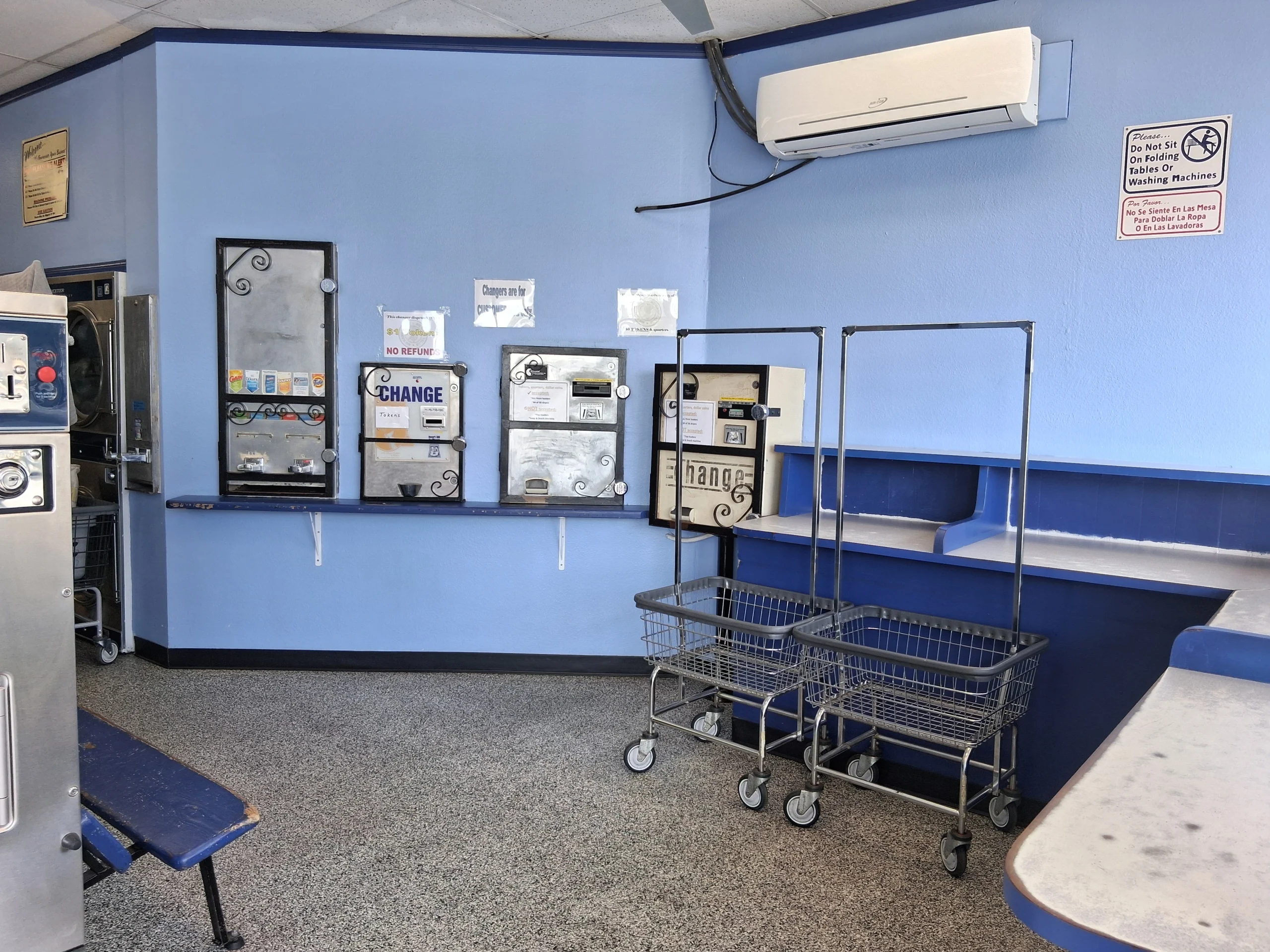 Change Machines & Laundry Carts a closer view of laundry equipment