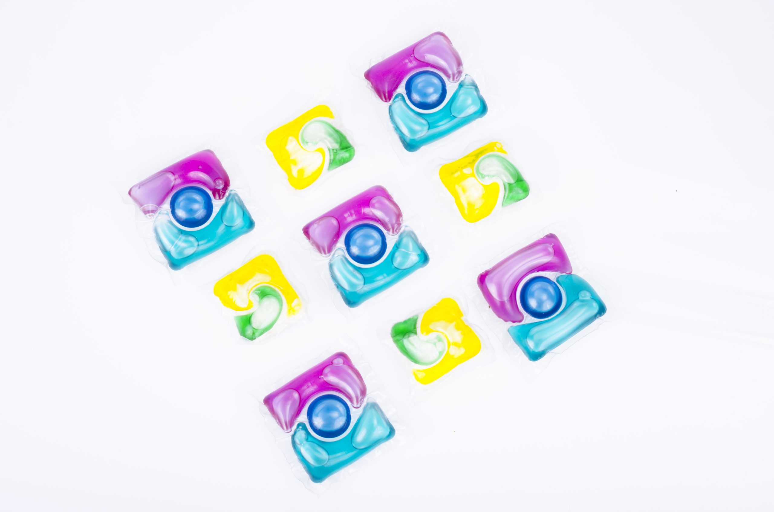 Multicolored capsules with gel for washing clothes and dishes. Studio Photo..